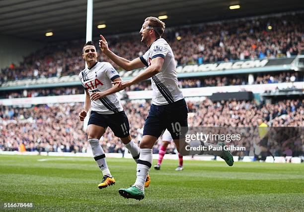 Harry Kane of Tottenham Hotspur celebrates as he scores their first goal during the Barclays Premier League match between Tottenham Hotspur and...