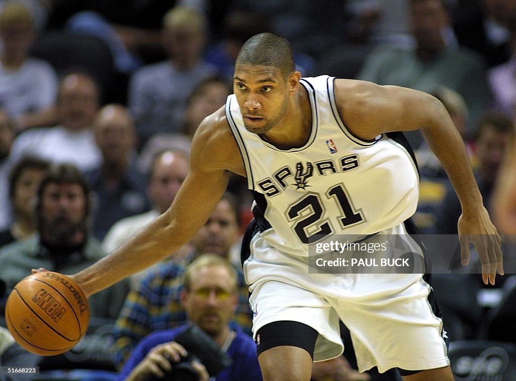 Tim Duncan of the San Antonio Spurs takes off upco
