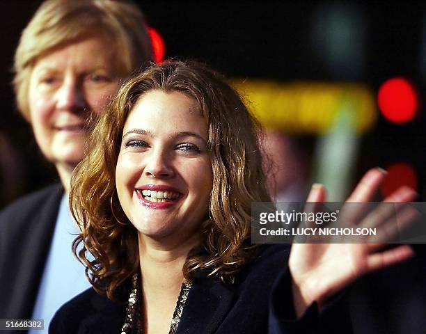 Actress Drew Barrymore arrives at the premiere of her film "Confessions of a Dangerous Mind," with her publicist Pat Kingsley, in Los Angeles, CA, 11...