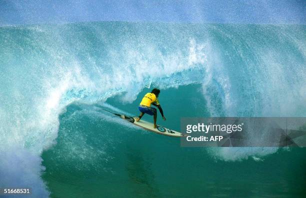World number two Californian Rob Machado competes on the North Shore, Oahu, Hawaii 14 December 2002. The Xbox Pipeline Masters is the final jewel in...