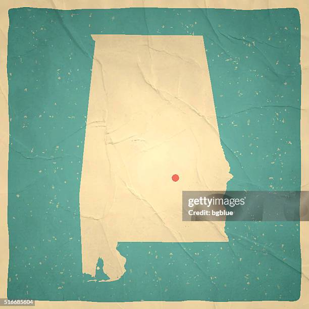 alabama map on old paper - vintage texture - birmingham alabama stock illustrations