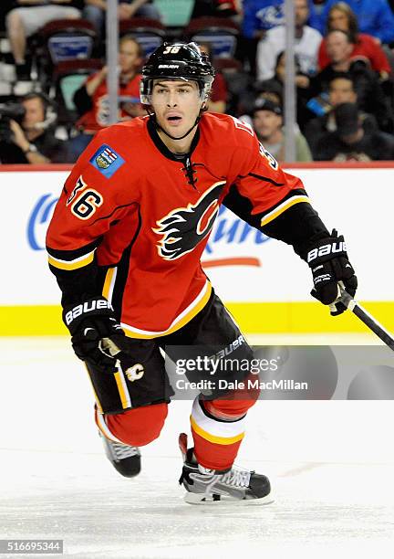 Raphael Diaz of the Calgary Flames plays against the Vancouver Canucks during the preseason game at Scotiabank Saddledome on September 25, 2014 in...