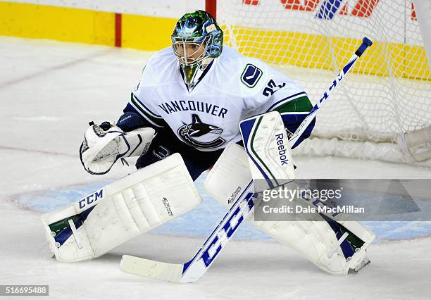 Goaltender Joacim Eriksson of the Vancouver Canucks plays against the Calgary Flames during the preseason game at Scotiabank Saddledome on September...