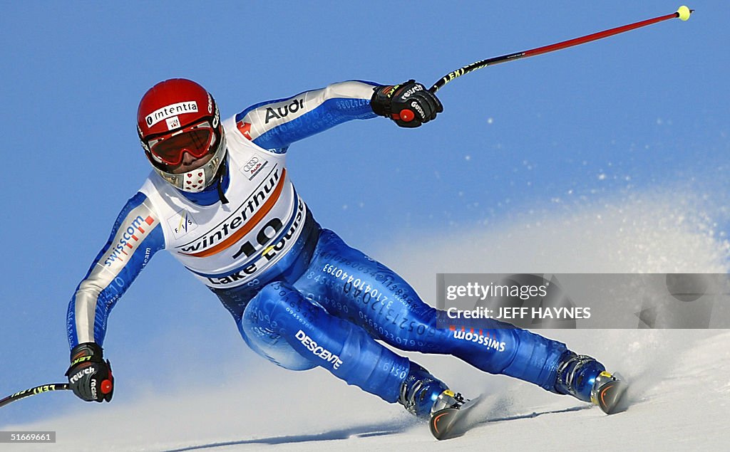 Franco Cavegn of Switzerland makes a turn past a g