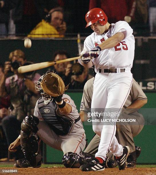 Troy Glaus hits a two run double to give the Angels the lead against the San Francisco Giants in the eighth inning of Game 6 of the World Series in...