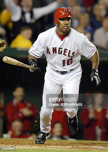 Anaheim Angels' Garret Anderson runs after hitting a three-run double against the San Francisco Giants in the third inning of Game Seven of the World...
