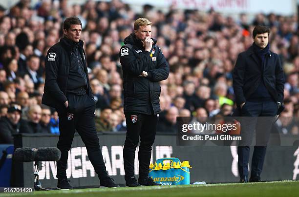 Eddie Howe manager of Bournemouth , assistant Jason Tindall and Mauricio Pochettino manager of Tottenham Hotspur look on during the Barclays Premier...