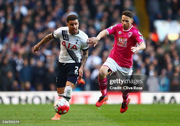 Kyle Walker of Tottenham Hotspur is chased by Marc Pugh of Bournemouth during the Barclays Premier League match between Tottenham Hotspur and A.F.C....