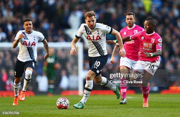 Harry Kane of Tottenham Hotspur is chased by Max Gradel of Bournemouth during the Barclays Premier League match between Tottenham Hotspur and A.F.C....