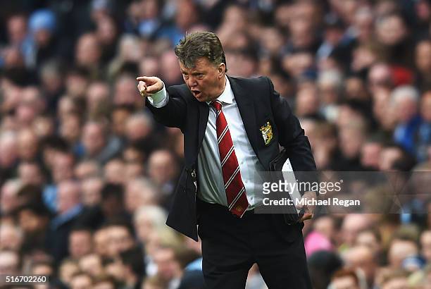 Louis van Gaal manager of Manchester United reacts during the Barclays Premier League match between Manchester City and Manchester United at Etihad...