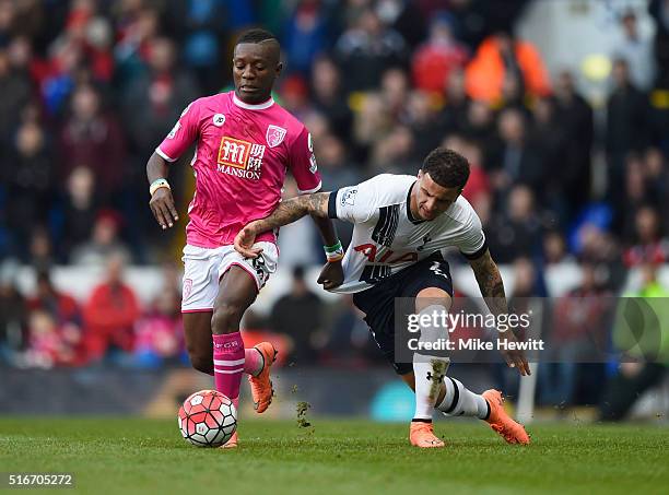 Max Gradel of Bournemouth holds off Kyle Walker of Tottenham Hotspur during the Barclays Premier League match between Tottenham Hotspur and A.F.C....