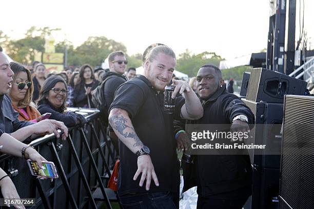 Security guards dance as Grupo Fantasma performs performs at SXSW Outdoor Stage at Ladybird Lake - 2016 SXSW Music, Film + Interactive Festival on...