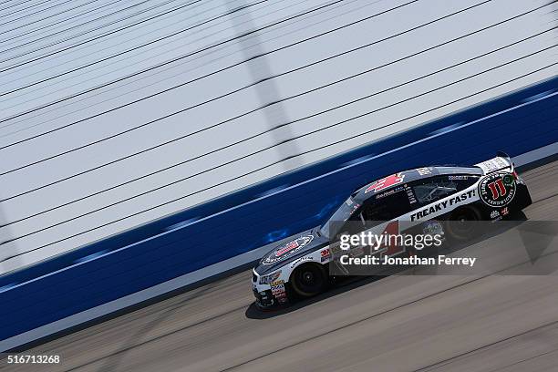 Kevin Harvick, driver of the Jimmy John's Chevrolet, races during the NASCAR Sprint Cup Series Auto Club 400 at Auto Club Speedway on March 20, 2016...