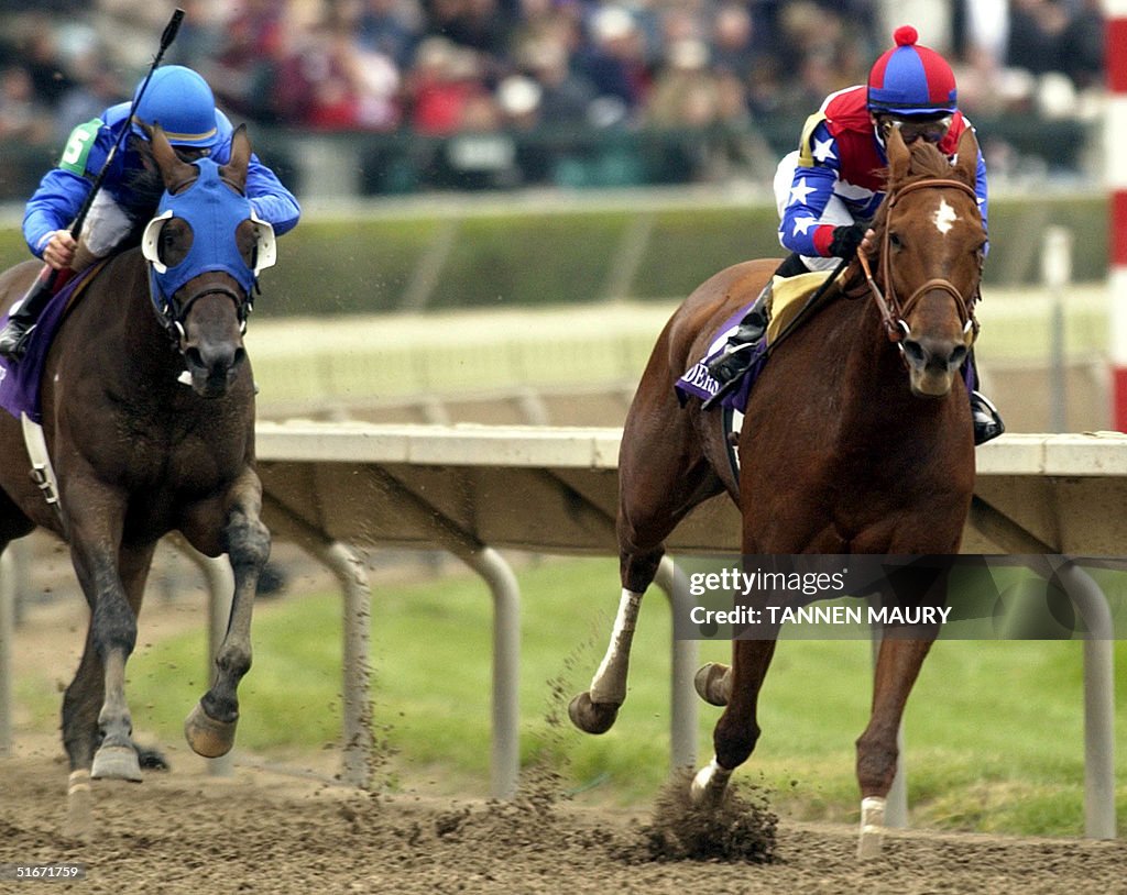 Azeri, ridden by jockey Mike Smith, pulls away fro