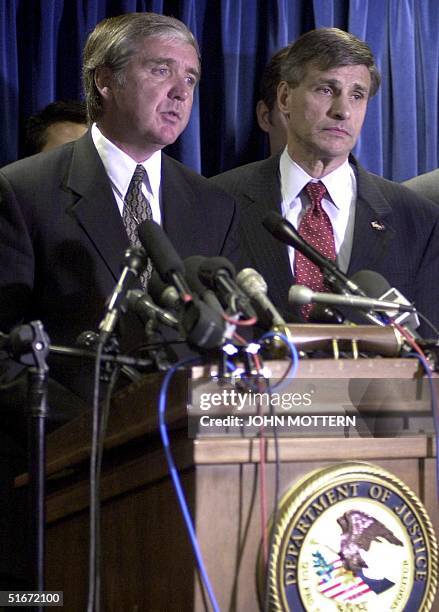 United States Attorney Michael Sullivan and FBI Special Agent Charles Prouty during a press conference 04 October, 2002 after Richard Reid known as...