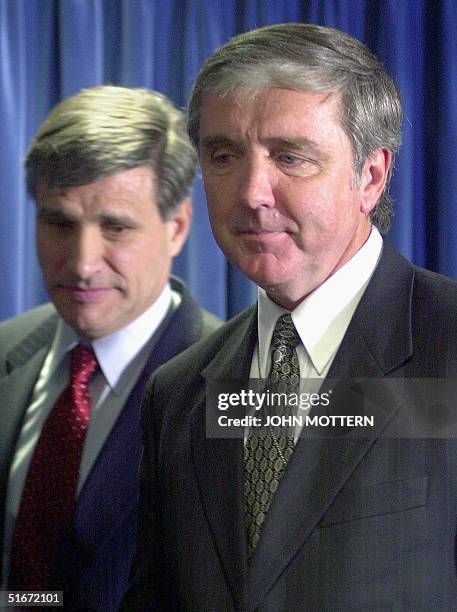 Attorney for the District of Massachusetts Michael Sullivan and FBI Special Agent Charles Prouty speak at a press conference 04 October 2002 after...