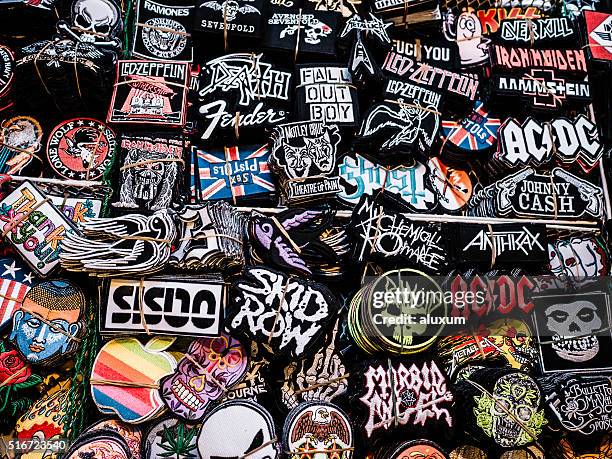 embroidered patches chatuchalk market bangkok - textile patch stock pictures, royalty-free photos & images