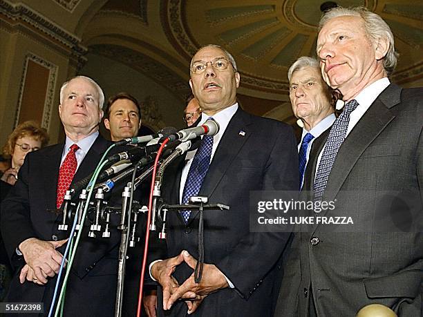 Sen. Joe Lieberman, D-CT, Sen. John Warner , R-VA, Sen. Evan Bayh , D-IN, and Sen. John McCain , R-AZ, listen to US Secretary of State Colin Powell...