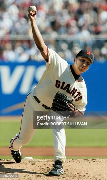 Starting pitcher Russ Ortiz of the San Francisco Giants pitches in the first inning to the St. Louis Cardinals, 12 October 2002, during game 3 of the...