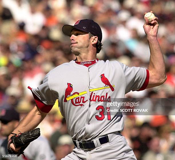 Starting pitcher Chuck Finley of the St. Louis Cardinals pitches in the first inning to the San Francisco Giants, 12 October 2002, during game 3 of...