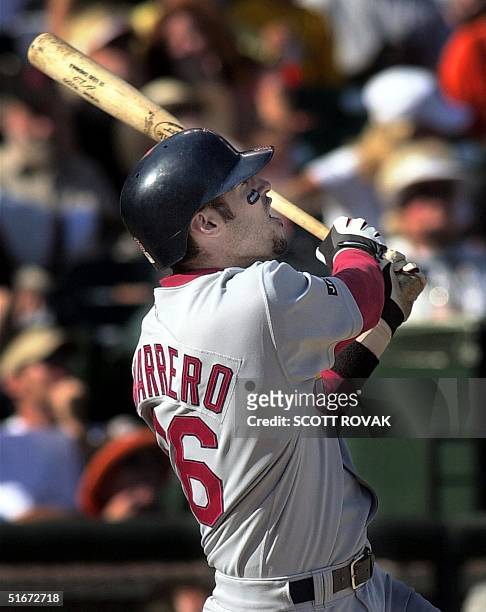 Eli Marrero of the St. Louis Cardinals watches his sixth inning solo home run against the San Francisco Giants, 12 October 2002, in game 3 of the...