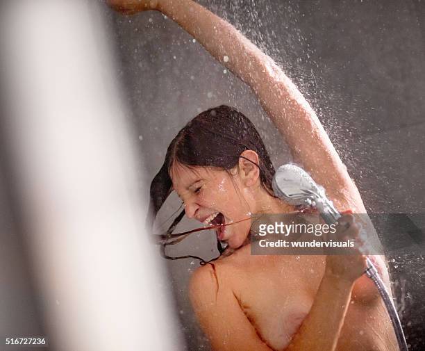 nude woman having fun in the shower - singing shower stock pictures, royalty-free photos & images