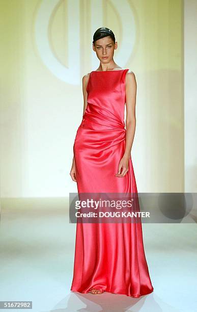 Model wears silk georgette dress at the Bill Blass Spring 2003 fashion show in New York 19 September 2002. AFP PHOTO/Doug KANTER