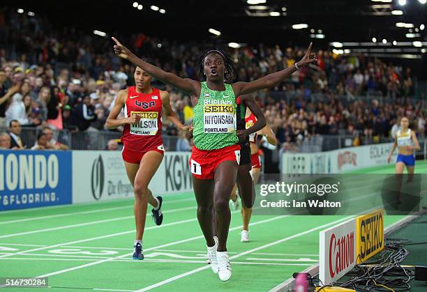 Francine Niyonsaba of Burundi crosses the line to win gold ahead of Ajee Wilson of the United States in the Women's 800 Metres Final during day four...