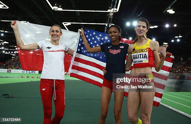 Bronze medallist Kamila Licwinko of Poland, gold medallist Vashti Cunningham of the United States and silver medallist Ruth Beitia of Spain in the...