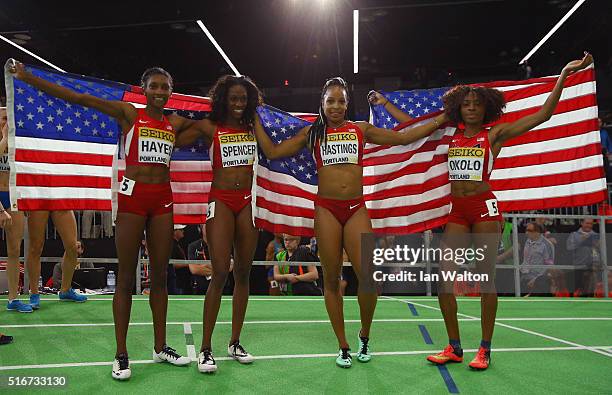 Quanera Hayes, Ashley Spencer, Natasha Hastings and Courtney Okolo of United States win gold in the Women's 4x400 Metres Relay Final during day four...