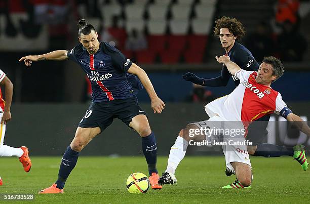 Zlatan Ibrahimovic of PSG and Jeremy Toulalan of Monaco in action during the French Ligue 1 match between Paris Saint-Germain v AS Monaco at Parc des...