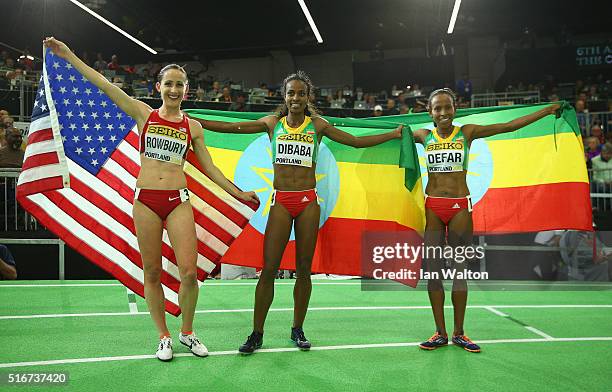 Bronze medallist Shannon Rowbury of the United States, gold medallist Genzebe Dibaba of Ethiopia and silver medallist Meseret Defar of Ethiopia pose...