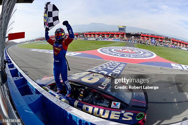 Jimmie Johnson, driver of the Lowe's / Superman Chevrolet, celebrates after taking the checkered flag during the NASCAR Sprint Cup Series Auto Club...