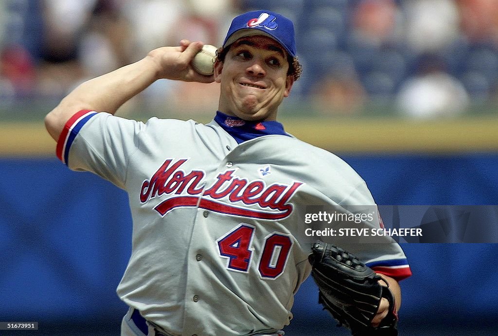 Montreal Expos' pitcher Bartolo Colon throws to th