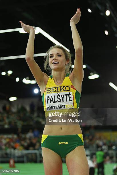 Airine Palsyte of Lithuania applauds the crowd as she competes in the Women's High Jump Final during day four of the IAAF World Indoor Championships...