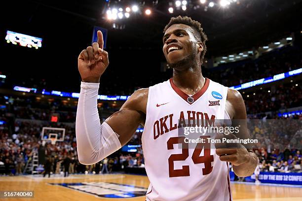 Buddy Hield of the Oklahoma Sooners celebrates after defeating the Virginia Commonwealth Rams with a score of 81 to 85 during the second round of the...