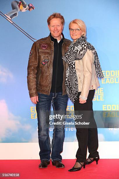 Dieter Thoma and his partner Mandana Daub during the 'Eddie the Eagle' premiere at Mathaeser Filmpalast on March 20, 2016 in Munich, Germany.