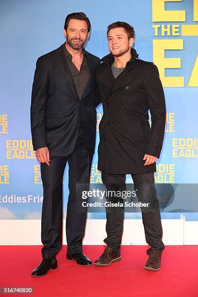 Hugh Jackman and Taron Egerton during the 'Eddie the Eagle' premiere at Mathaeser Filmpalast on March 20, 2016 in Munich, Germany.