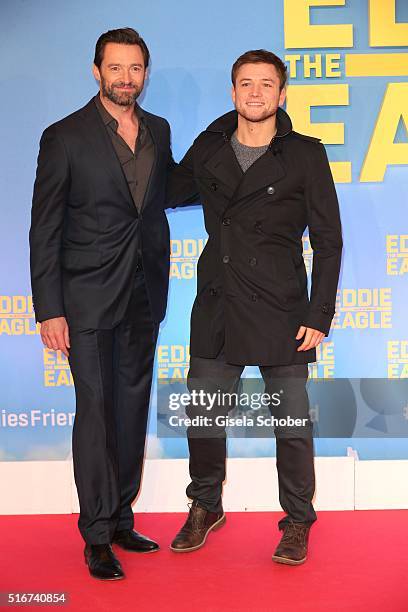 Hugh Jackman and Taron Egerton during the 'Eddie the Eagle' premiere at Mathaeser Filmpalast on March 20, 2016 in Munich, Germany.