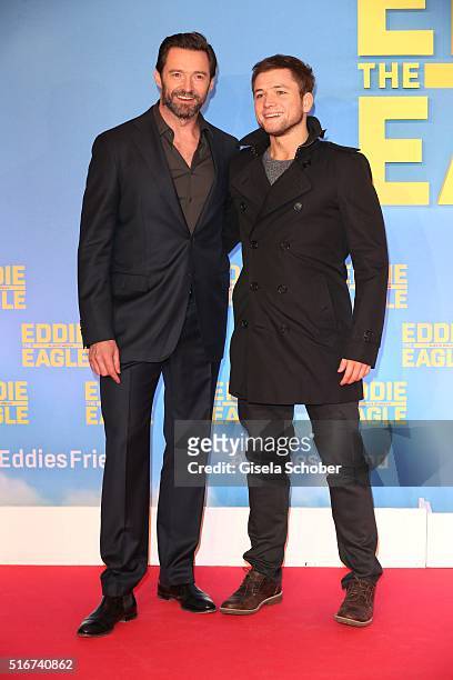Hugh Jackman and Taron Egerton during the 'Eddie the Eagle' premiere at Mathaeser Filmpalast on March 20, 2016 in Munich, Germany.