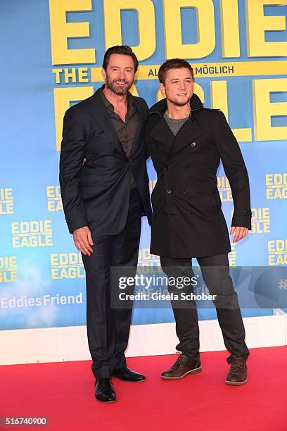 Hugh Jackman and Taron Egerton during the 'Eddie the Eagle' premiere at Mathaeser Filmpalast on March 20, 2016 in Munich, Germany.