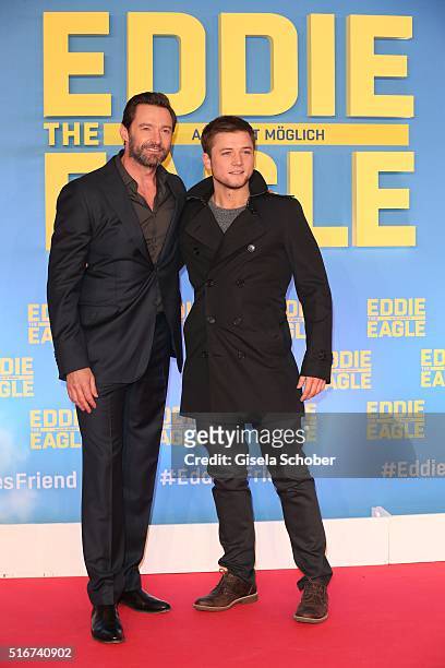 Hugh Jackman and Taron Egerton during the 'Eddie the Eagle' premiere at Mathaeser Filmpalast on March 20, 2016 in Munich, Germany.