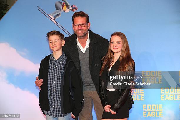 Kai Woersching and his son Luca and a friend Sophie during the 'Eddie the Eagle' premiere at Mathaeser Filmpalast on March 20, 2016 in Munich,...