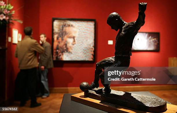 Louise Simson's lot 'Winning Goal' is seen ahead of an auction of sculptures, paintings and photographs inspired by modern-day football legend David...