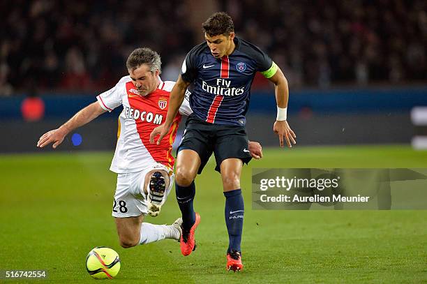 Thiago Silva of Paris Saint-Germain and Jeremy Toulalan of AS Monaco fight for the ball during the French Ligue 1 match between Paris Saint-Germain...