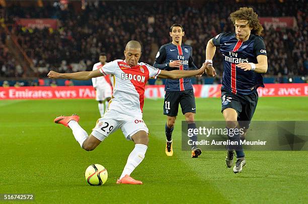 Kylian Mbappe of AS Monaco kicks the ball during the French Ligue 1 match between Paris Saint-Germain and AS Monaco at Parc des Princes on March 20,...