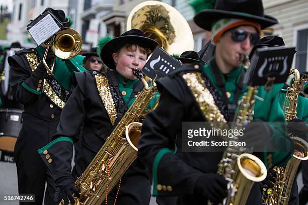 Members of a marching band during the annual South Boston St. Patrick's Parade passes on March 20, 2016 in Boston, Massachusetts. According to parade...