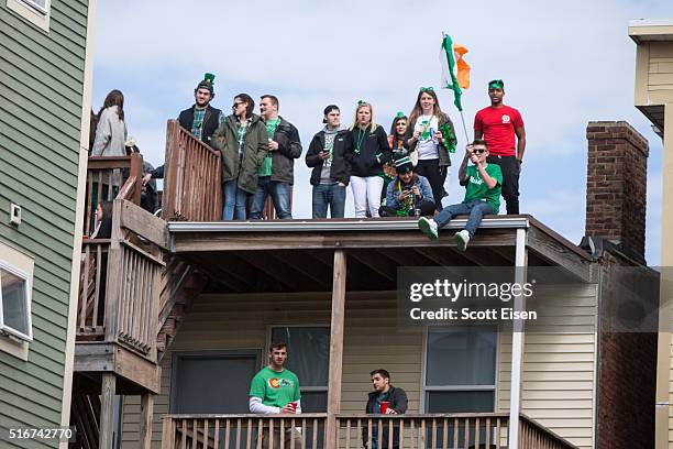 Paradegoers watch as the annual South Boston St. Patrick's Parade passes on March 20, 2016 in Boston, Massachusetts. According to parade organizers,...
