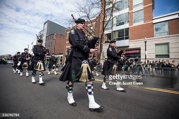 The Boston Police Gaelic Column of Pipes and Drums marches during the annual South Boston St. Patrick's Parade passes on March 20, 2016 in Boston,...