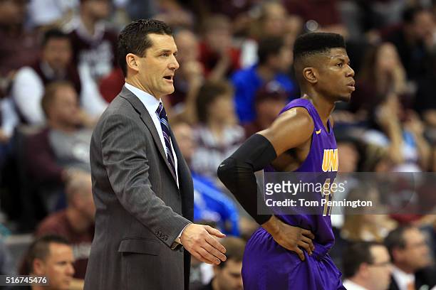 Head coach Ben Jacobson and Wes Washpun of the Northern Iowa Panthers look on in the first half against the Texas A&M Aggies during the second round...
